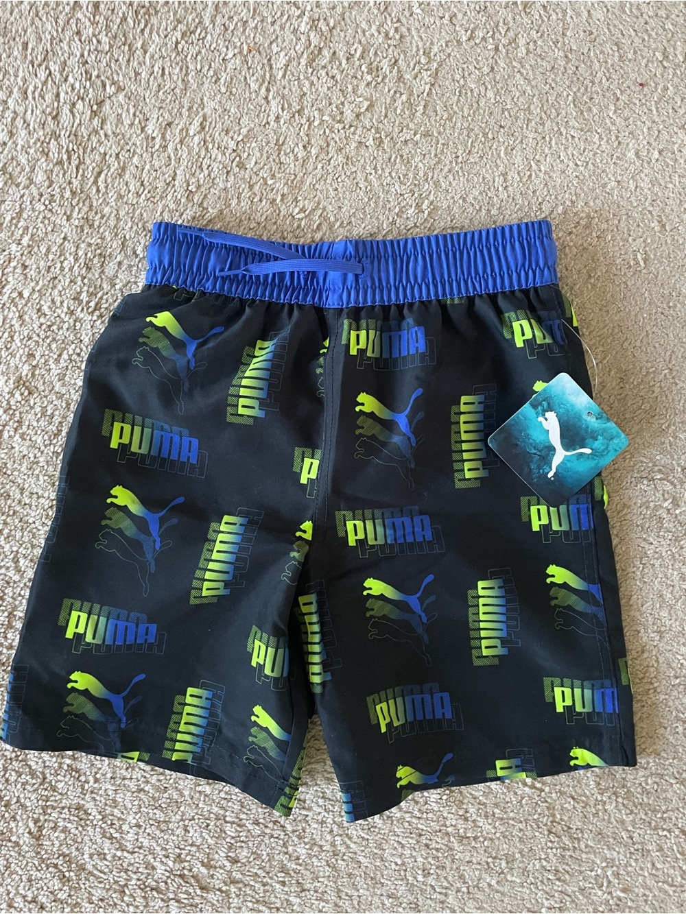 Puma Black Swim Shorts with Blue Waistband and Neon Green Accents